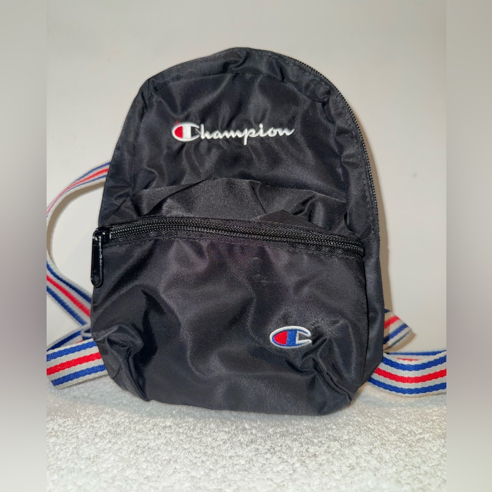 Champion Black Mini Backpack with Sporty Straps and Iconic Logo. NWOT
